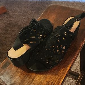 A black see through pair of casual shoes